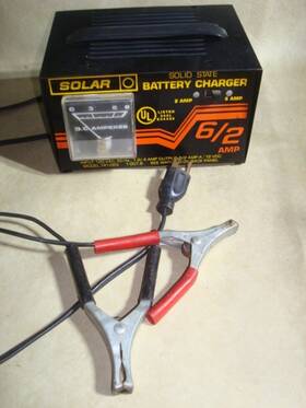 141-083 Solar Vintage 6/2 Amp 12 V Solid State Battery Charger. No. Tested
