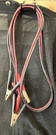 Set Of Booster / Jumper Cables, Good Preowned Working Condition. Fixed Price $10.00.