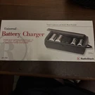 Universal Battery Charger Radio Shack 23-334 Charges 9V, Aaa, C, New Oob. Fixed Price $35.00.