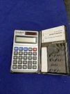 Vintage Radioshack Dual Powered Pocket Calculator 65-924 Wallet Case & Manual. Fixed Price $8.00.