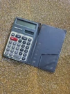 Vtg Radio Shack EC-215 Solar Pocket Tax Calculator W/black Case Tested & Working. Fixed Price $11.98.