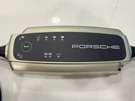 Porsche Charge-o-mat Pro Car Charger. Fixed Price $129.99.