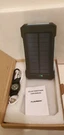 Floureon Solar Powered Bank Charger New. Fixed Price $26.00.