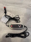 Corvette Battery Conditioner W/ Crossed Flags Logo 110V C6-C8 Oem Gm 8553067. Fixed Price $129.99.