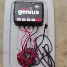 Noco Genius 4-BANK 40A Battery Charger For 12V Batteries. Fixed Price $200.00.