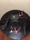 Performax 6V-12V Battery Charger And Maintainer With Sets Of Clamps. Fixed Price $37.00.
